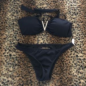 Vi Tori’s secret black and gold bathing suit